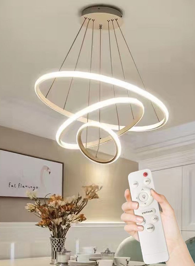 A fashionable LED pendant light with three light rings, featuring three different light colors, adjustable height, suitable for living room, dining room, living area, bedroom and corridor. - Image 1