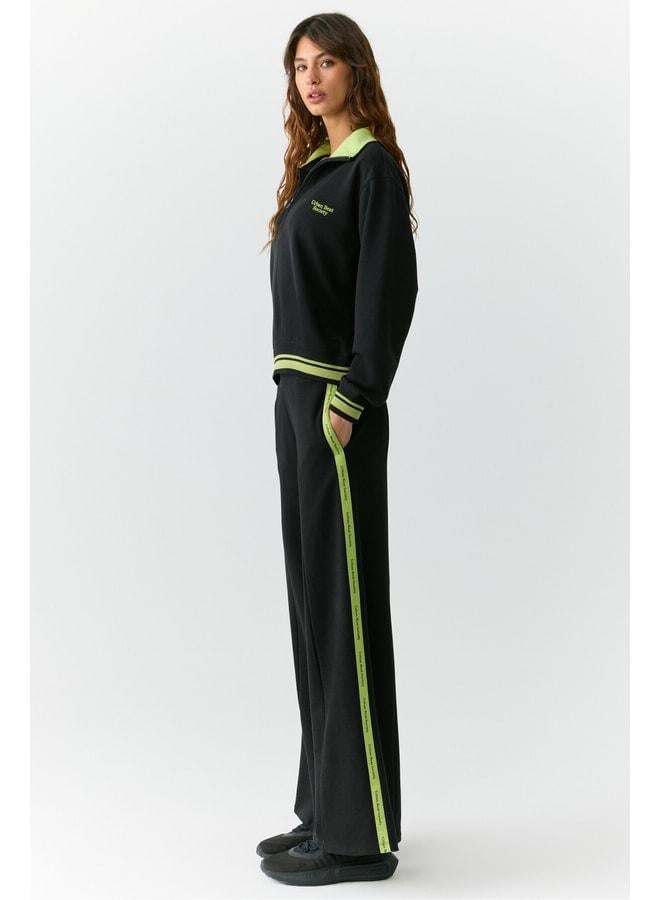 URBAN BEAT NATAN Women’s Relaxed Black Sweatshirt with Stand-up Collar, Zip Closure and Printed Details. - Image 2
