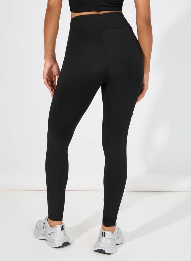 Styli Active Broad Waistband Thigh Side Pocket Detail Leggings