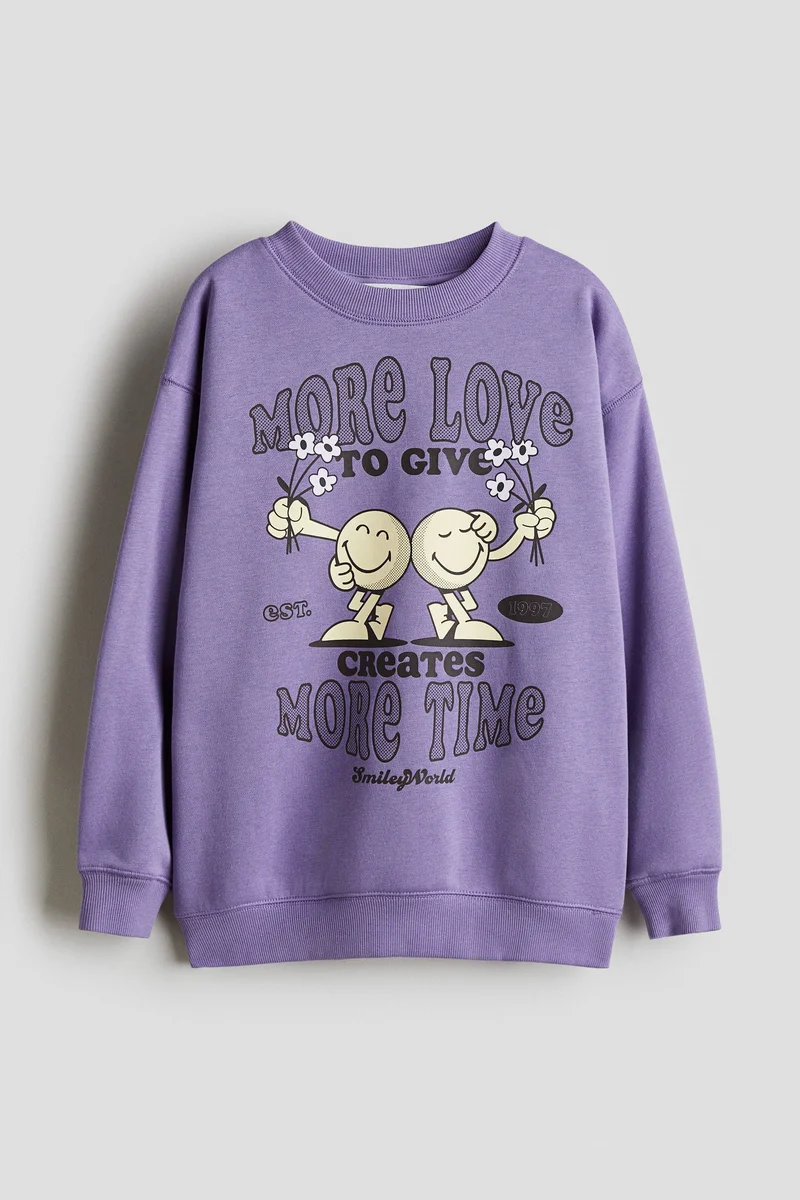 اتش اند ام سويت-شيرت فضفاض بطبعة مميزة