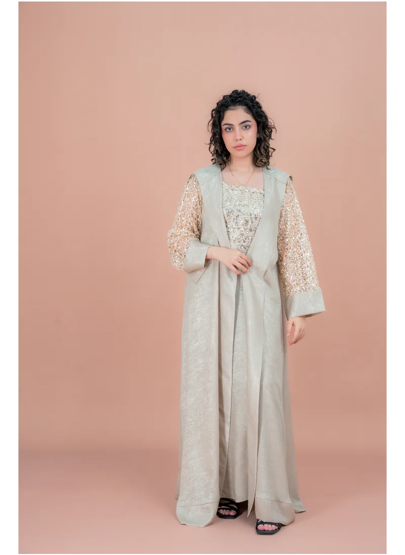 اكسا جلابية بتصميم عصري لامع