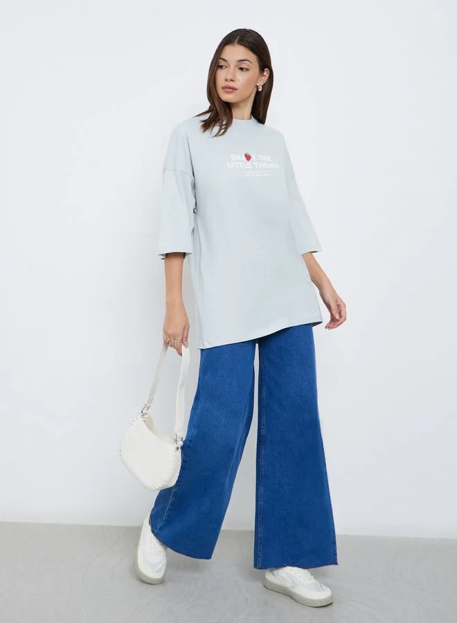 Styli Styli Light Blue Oversized Slogan T-Shirt