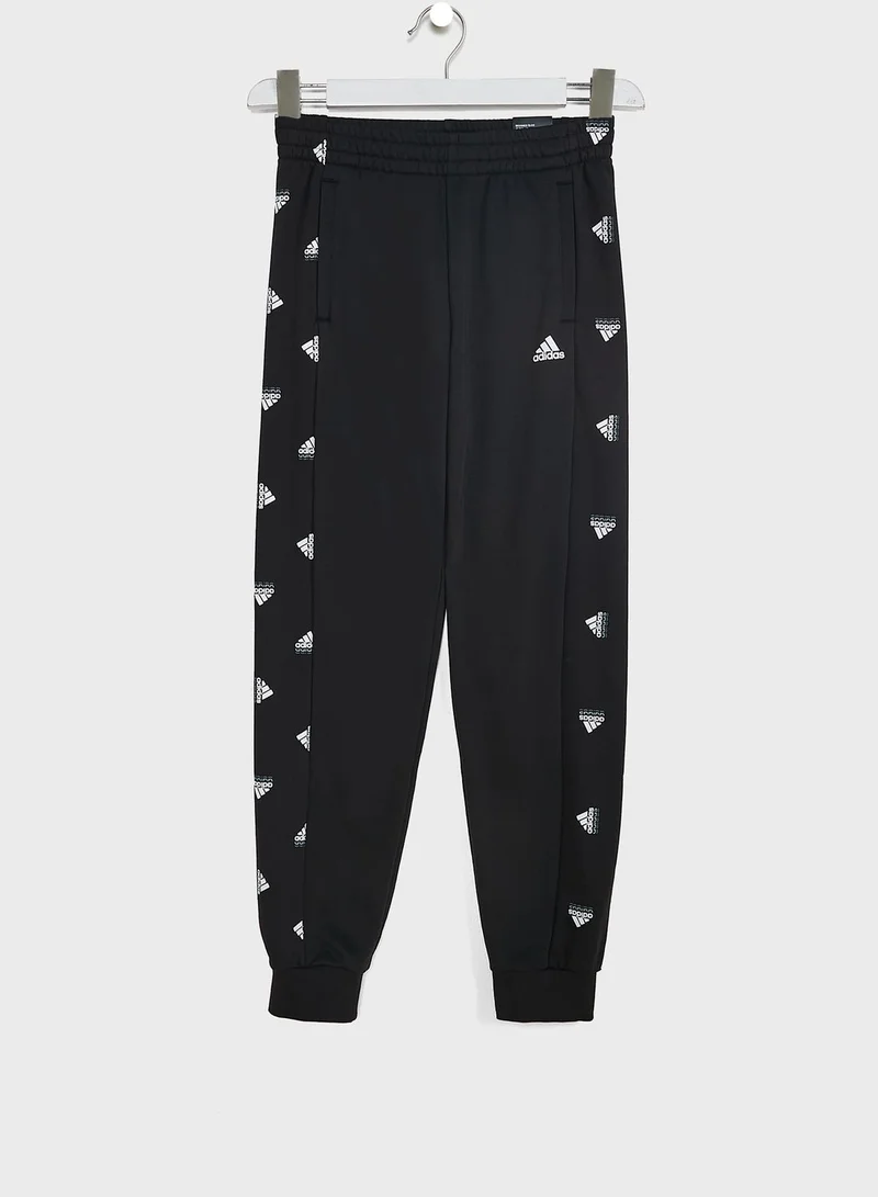 adidas بنطال رياضي بجيوب جانبية
