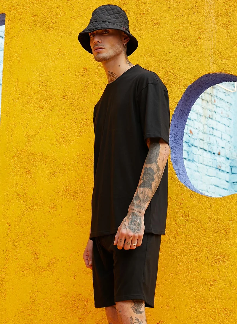 Campus Sutra Men's Oversized Solid Black Casual Co-Ord Set