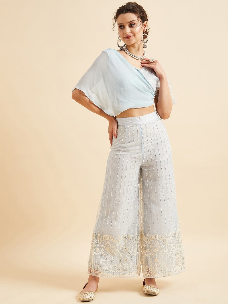 بانيت طقم متناسق (Co-ord Set) بلوزة قصيرة مطرَّزة من قماش الشبك (Net) مع بنطلون بالازو - Image 1