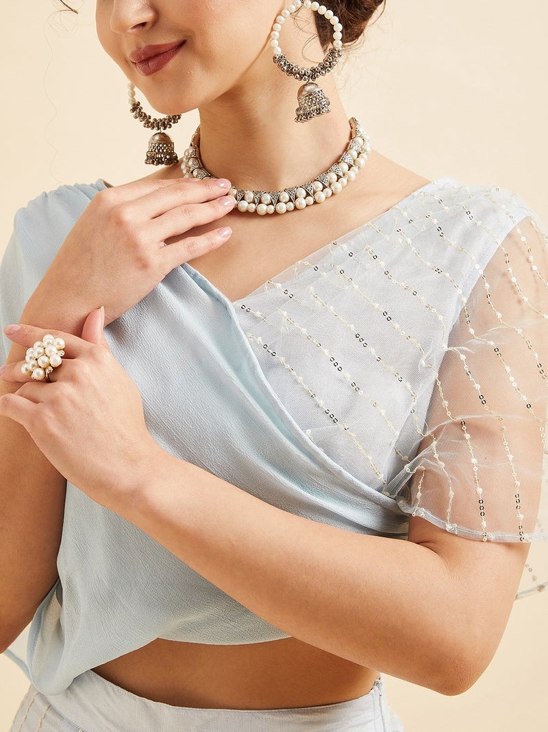 بانيت طقم متناسق (Co-ord Set) بلوزة قصيرة مطرَّزة من قماش الشبك (Net) مع بنطلون بالازو - Image 4