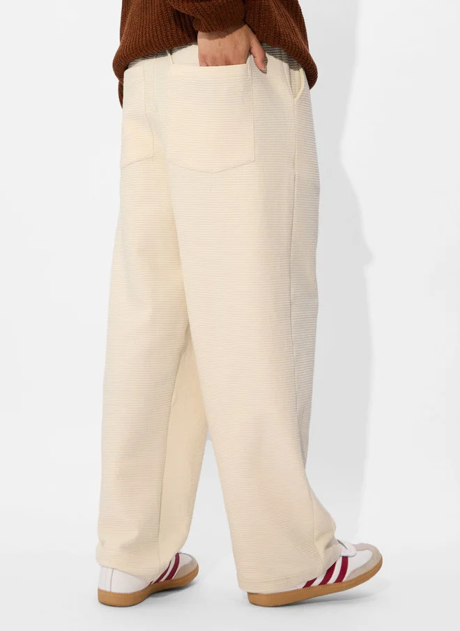 The Souled Store  The Souled Store Men Off-White Solid Cotton Straight Fit Joggers  | Best Price UAE