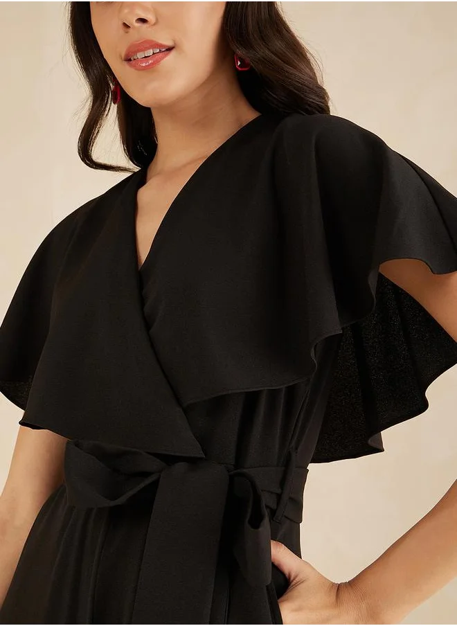 فيميلا Solid Kimono Wrap Jumpsuit with Ruffled Sleeves by Styli