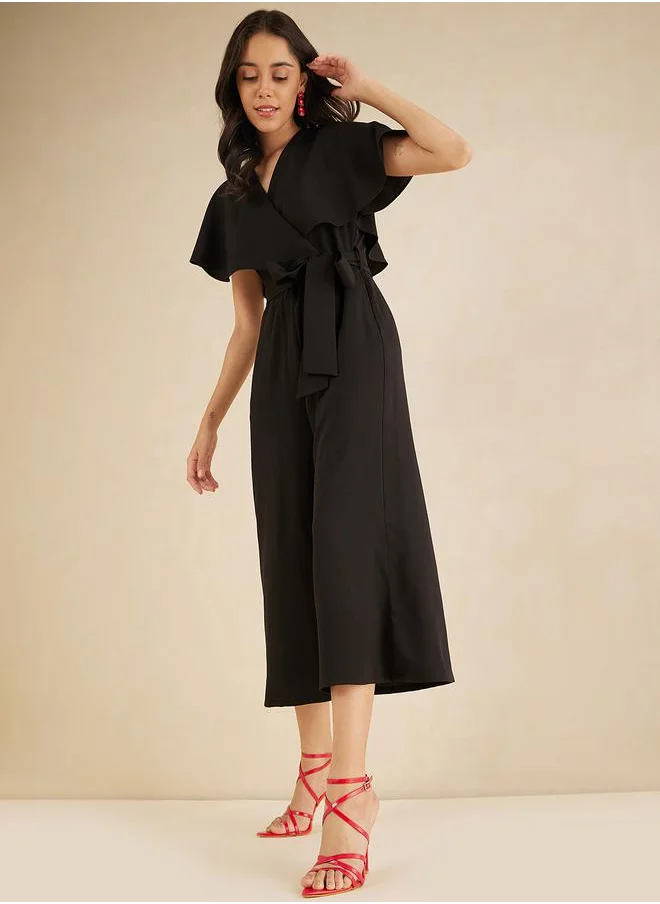 فيميلا Solid Kimono Wrap Jumpsuit with Ruffled Sleeves by Styli