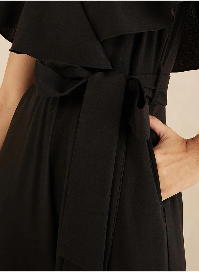 فيميلا Solid Kimono Wrap Jumpsuit with Ruffled Sleeves by Styli