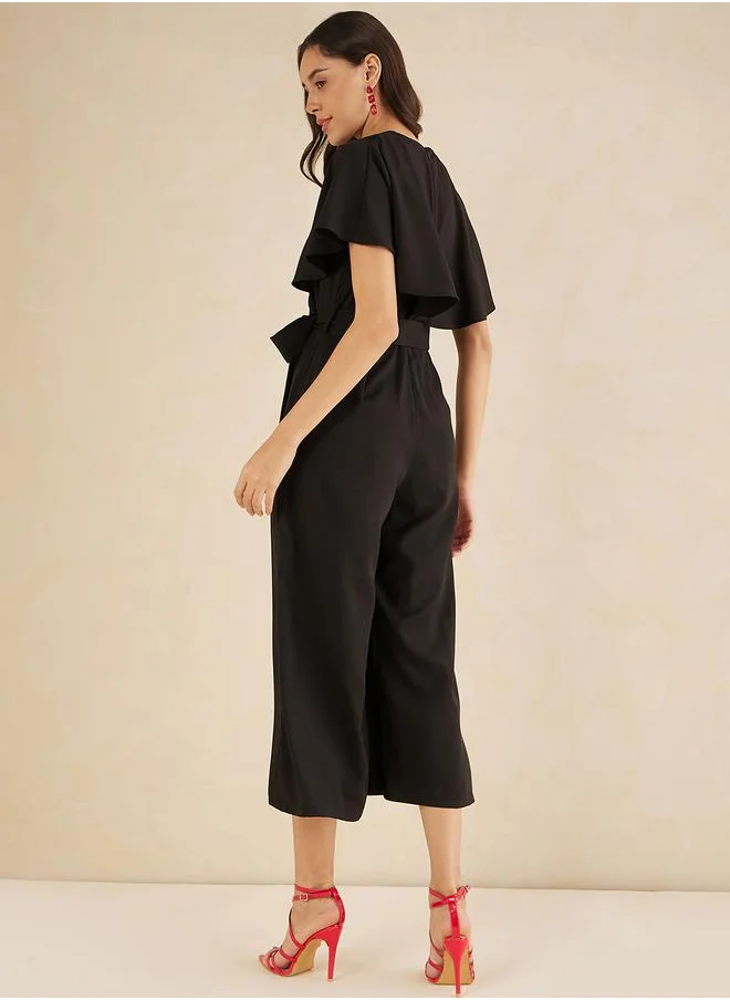 فيميلا Solid Kimono Wrap Jumpsuit with Ruffled Sleeves by Styli