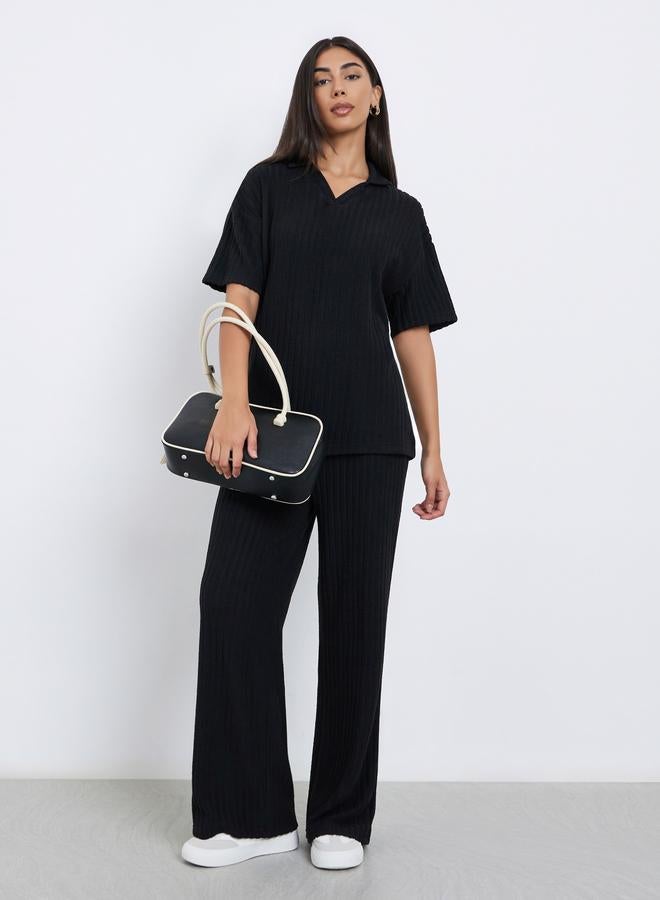 ستايلي بنطال محبوك بأرجل واسعة وتفاصيل مُضلعة - Image 1