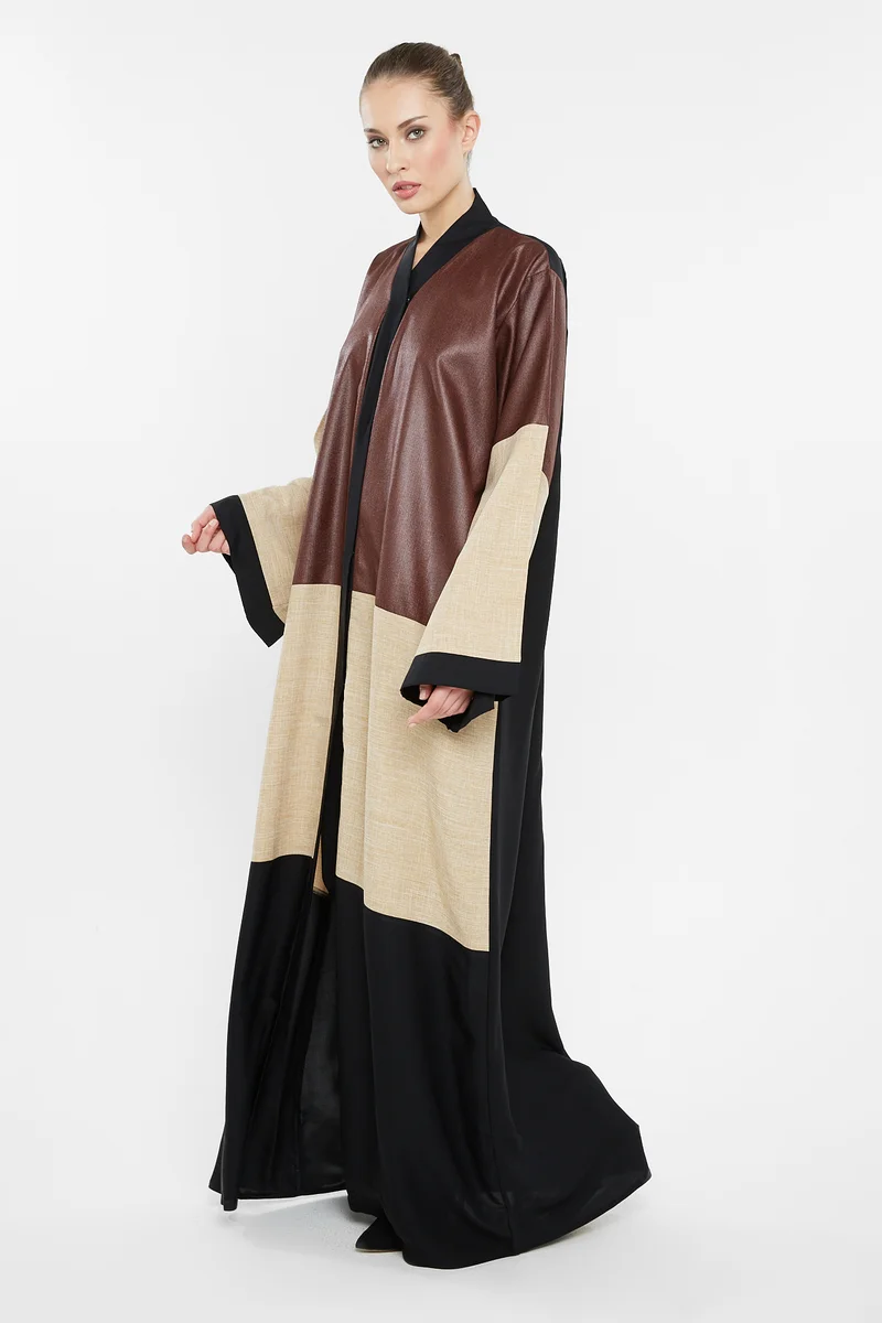 النخبة A casual duo-colored abaya in shimmer-brown and cream with cross cut detail -AJ136A