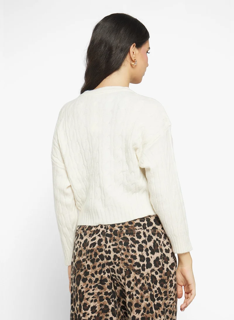 جينجر كنزة صوفية سميكة بنقشة الكابل