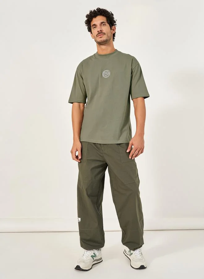 Styli Printed Oversized Cotton Rich T-Shirt with Mock Neck Detail
