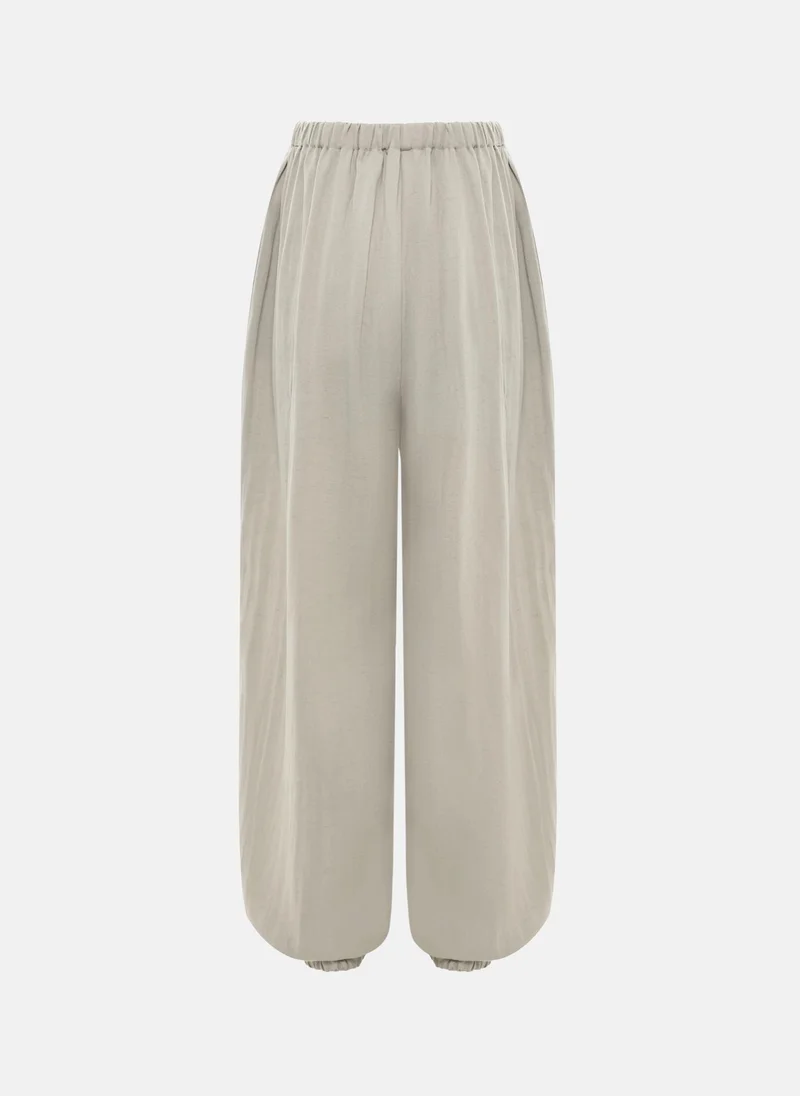 Lichi  Lightweight textured trousers with elasticated cuffs for Women | Best Price UAE