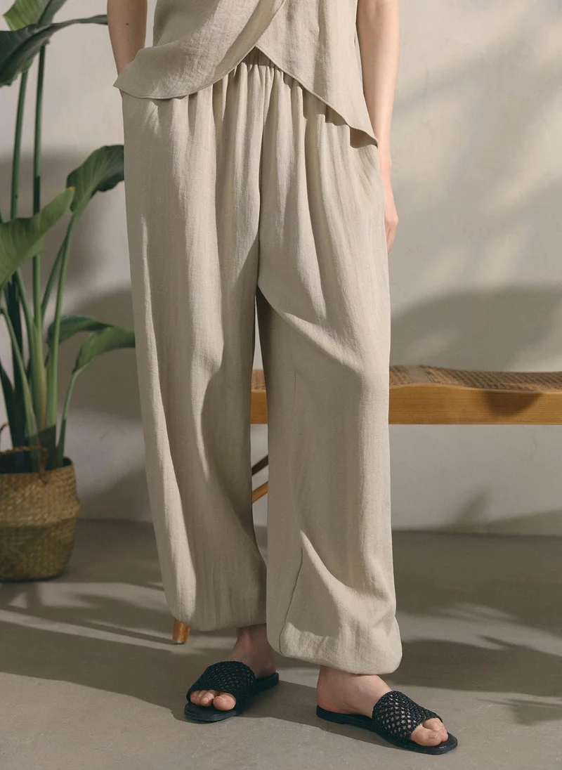 Lichi  Lightweight textured trousers with elasticated cuffs for Women | Best Price UAE