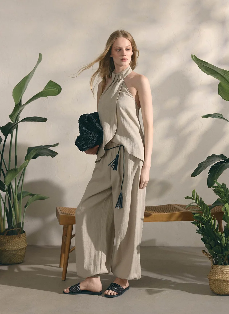 Lichi  Lightweight textured trousers with elasticated cuffs for Women | Best Price UAE
