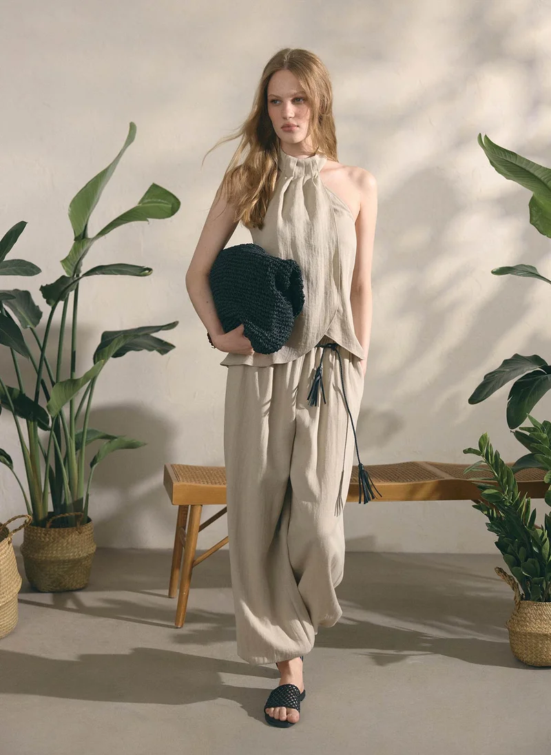 Lichi  Lightweight textured trousers with elasticated cuffs for Women | Best Price UAE