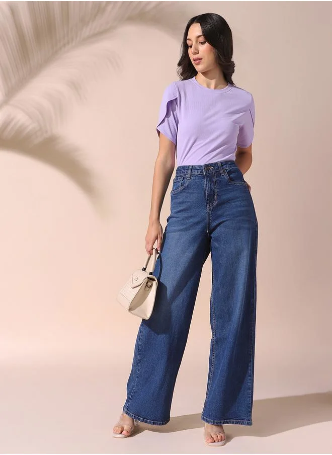 Dennis Lingo Women indigo relaxed fit solid 98% cotton 2% spandex jeans with button & zip closure- perfect for making bold moves.