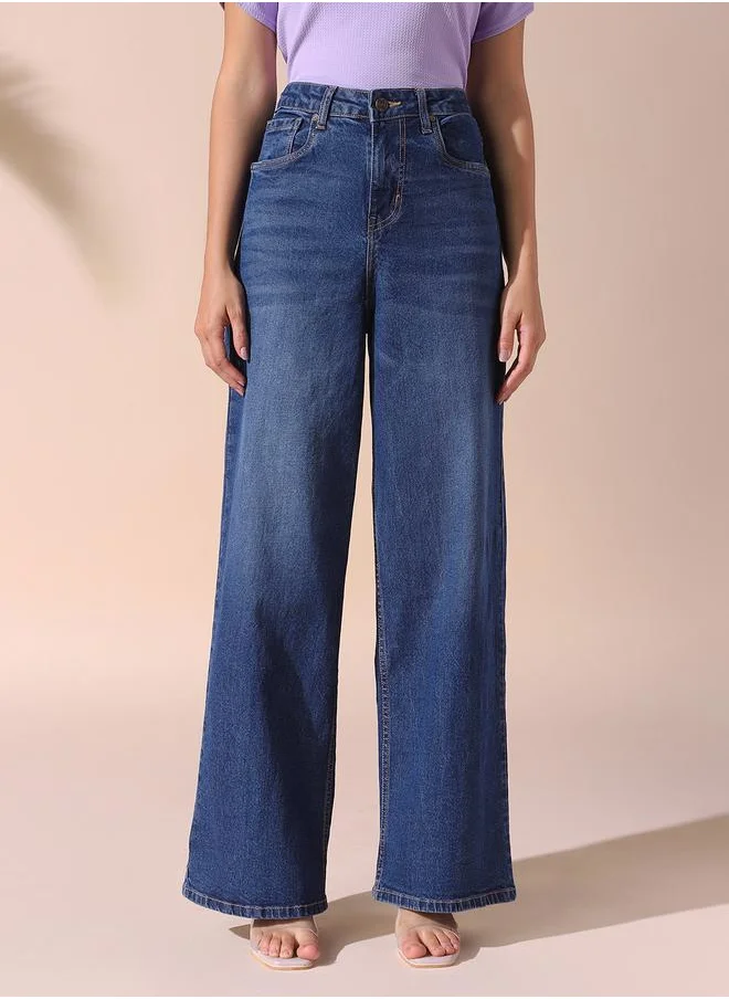 Dennis Lingo Women indigo relaxed fit solid 98% cotton 2% spandex jeans with button & zip closure- perfect for making bold moves.