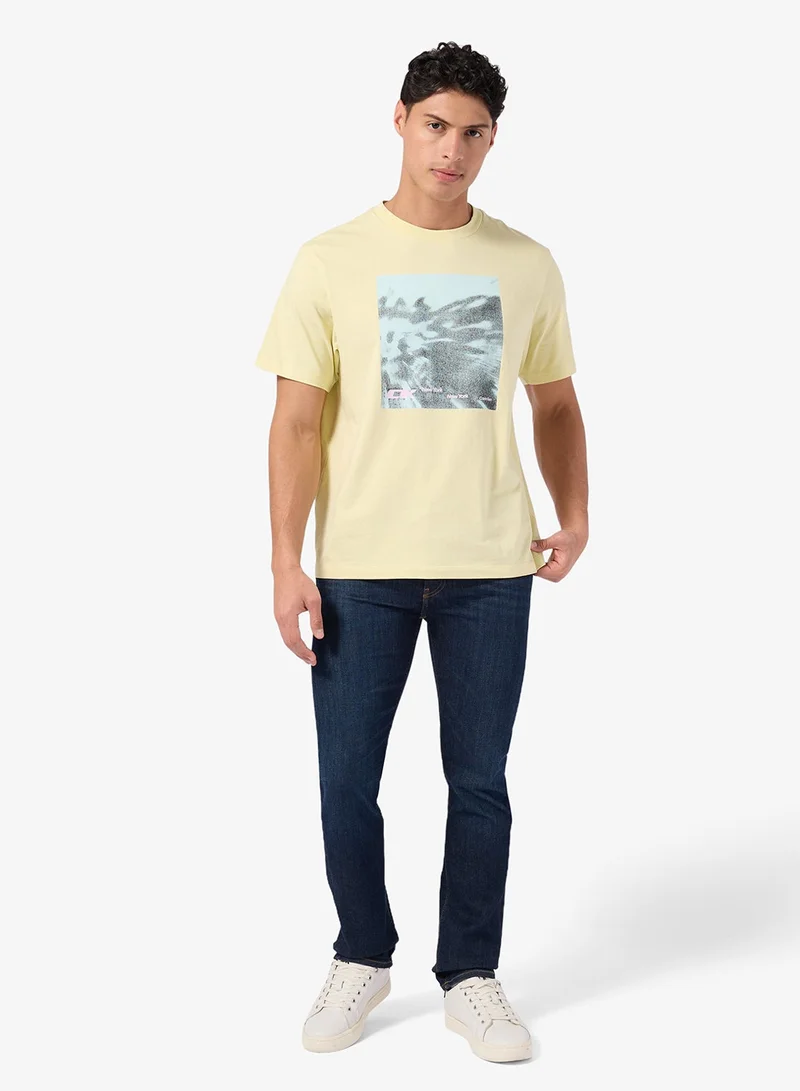 Calvin Klein Jeans  Floral print Graphic Short Sleeve T-Shirt for Men | Best Price UAE