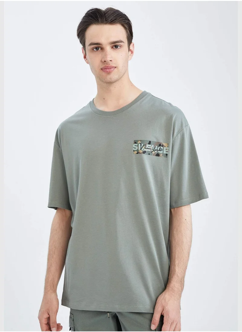 ديفاكتو Oversized Short Sleeve Back Slogan Print T-Shirt