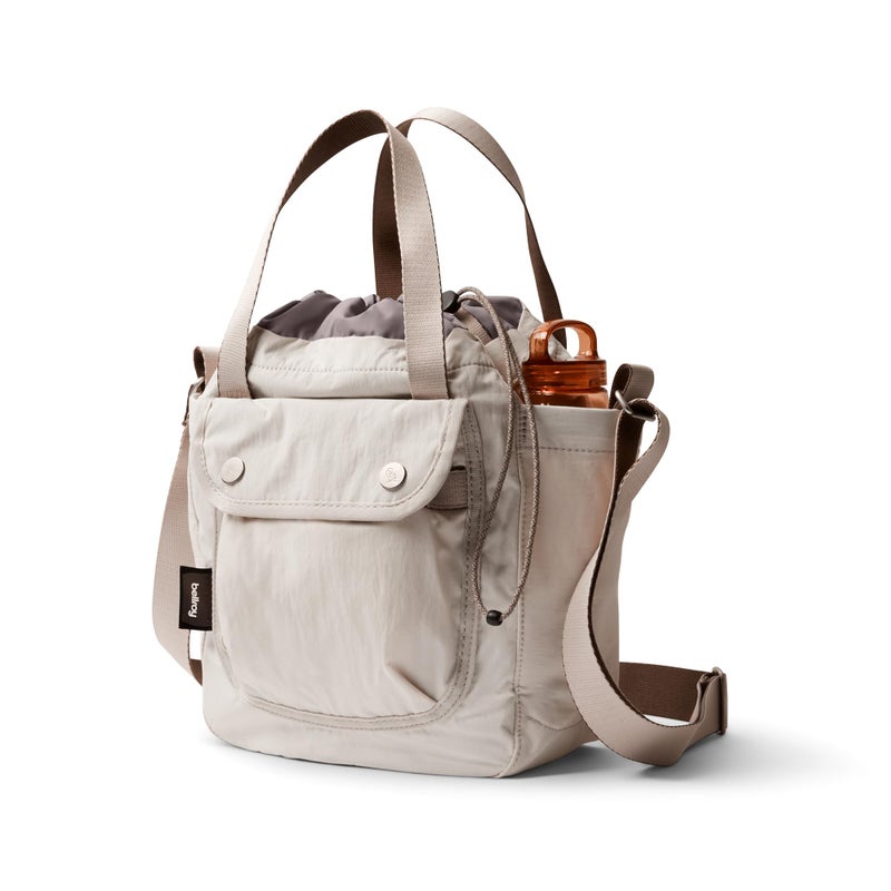 Bellroy Cinch Bucket Bag (compact 9 liter lightweight crossbody bag with external organization, internal zip pocket, adjustable shoulder strap, and adapts to be carried three ways) - Oat - Image 1