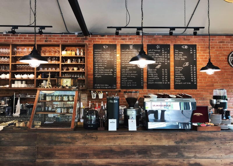 BELECO 7x5ft Fabric Cozy Coffee Restaurant Bar Backdrop for Photography Coffee Shop Interior Vintage Brick Wall Wooden Counter Background for Party Decorations Photo Booth Studio Props Wallpaper - Image 2