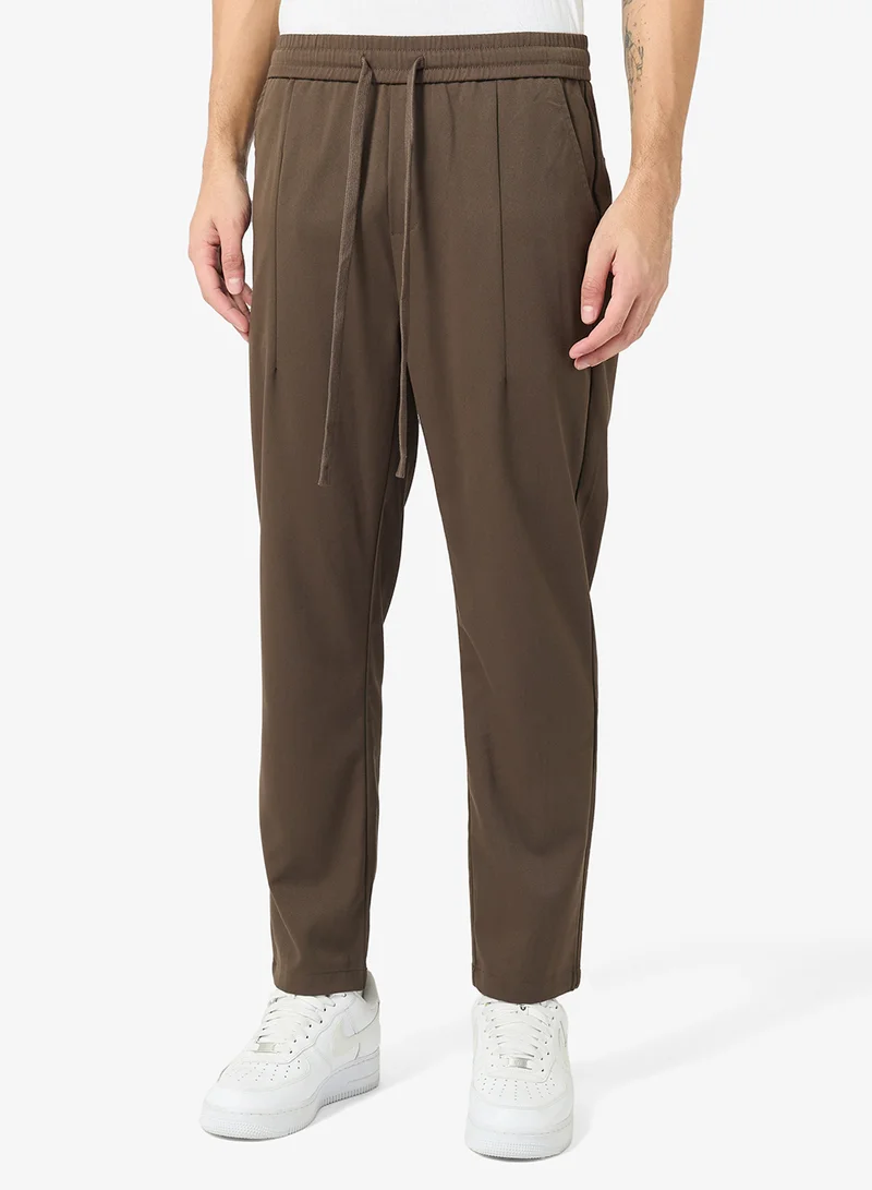 أنوذر كوتون لاب  بنطلون واسع مطوي