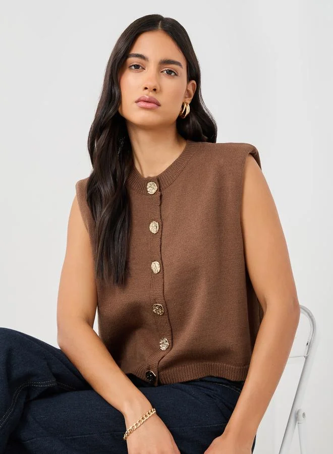 ستايلي Styli Solid Buttoned Sleeveless Top with Shoulder Pad Detail