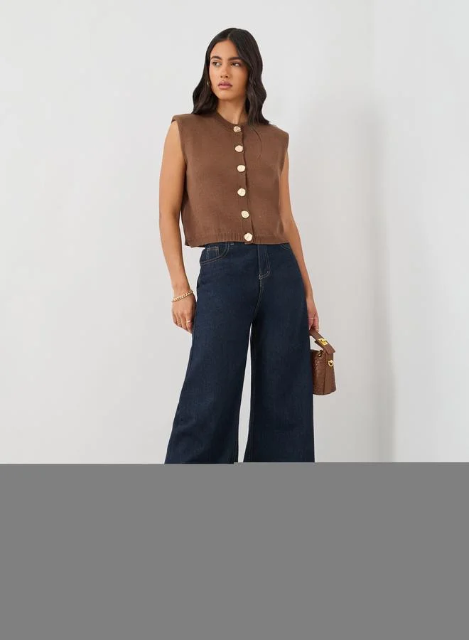 ستايلي Styli Solid Buttoned Sleeveless Top with Shoulder Pad Detail