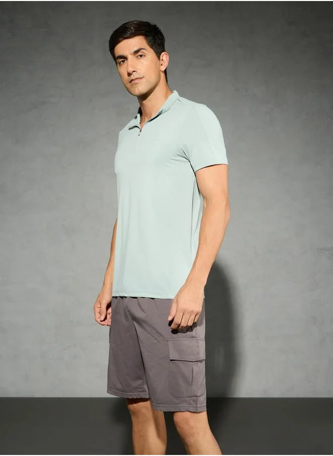 تكنوسبورت Technosport Solid 4-Way Stretch Half Zip Front Slim Fit Polo T-Shirt