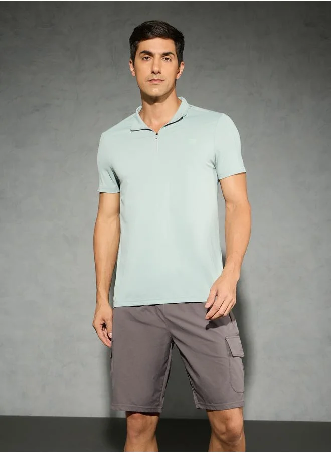 تكنوسبورت Technosport Solid 4-Way Stretch Half Zip Front Slim Fit Polo T-Shirt