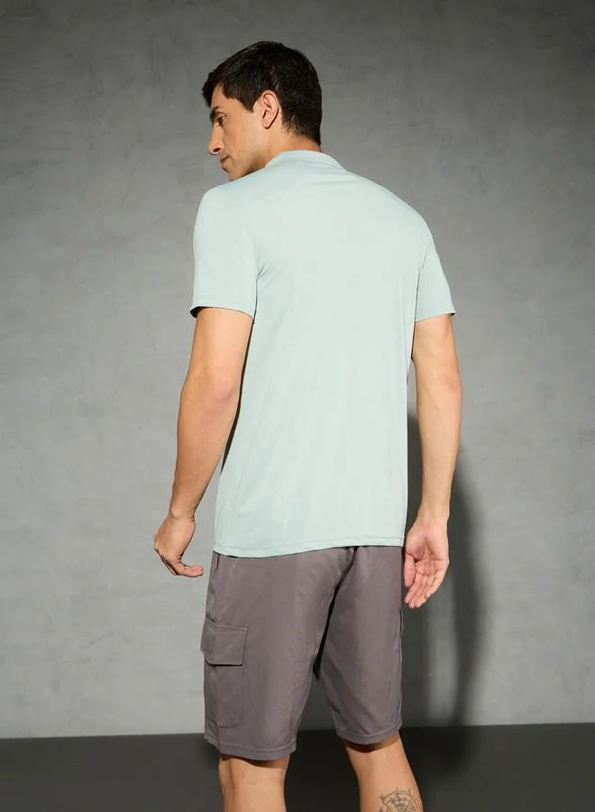 Technosport  Technosport Solid 4-Way Stretch Half Zip Front Slim Fit Polo T-Shirt for Men | Best Price UAE