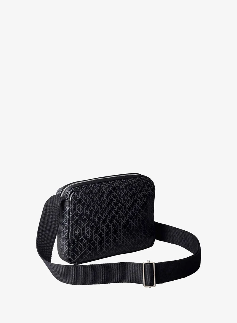 CALVIN KLEIN Black / Poppy Seed AOP Coated Emblem Logo Crossbody Camera Bag for Men | Best Price UAE
