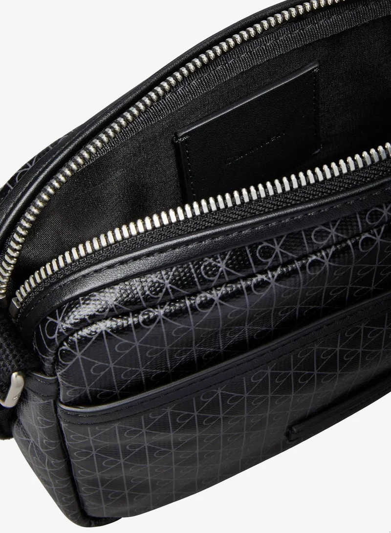 CALVIN KLEIN Black / Poppy Seed AOP Coated Emblem Logo Crossbody Camera Bag for Men | Best Price UAE