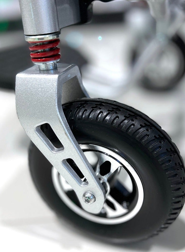 كروني كرسي متحرك كهربائي خفيف الوزن قابل للطي 6012 للبالغين - سعة 350 رطلاً، هيكل من سبائك الألومنيوم لجميع التضاريس، محركان 250 وات × 2، بطارية 24 فولت 12 أمبير/ساعة، 5 سرعات قابلة للتعديل، مدى 10-25 كم، تصميم مضغوط مع عجلات خلفية 12 بوصة، عجلات أمامية 8 بوصة، سهل الطي والنقل، غطاء مقاوم للماء، وسادة مقعد مريحة، وملحقات عملية لكبار السن والمستخدمين ذوي الإعاقة - مثالي للاستخدام الداخلي والخارجي، مثالي للسفر مع وقت شحن سريع من 6 إلى 9 ساعات، مصمم لسهولة المناورة والاستقرار على المنحدرات التي تصل إلى 12 درجة، مناسب للاستخدام المنزلي والسيارة مع خيارات وصلة السيارة والمنحدر، رائع للاستخدام ككرسي متحرك كهربائي، مناسب للأنشطة اليومية والتسوق ومساعدة التنقل - Image 3