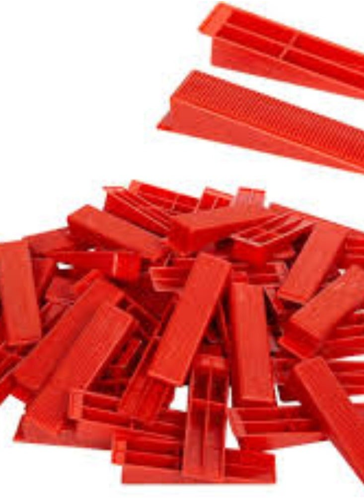 KNP - KNP Red Wedges Tile Leveling System Pack of 100 These systems are used to reduce lippage (uneven tile edges) and create a seamless finish in tiling projects. - Image 1