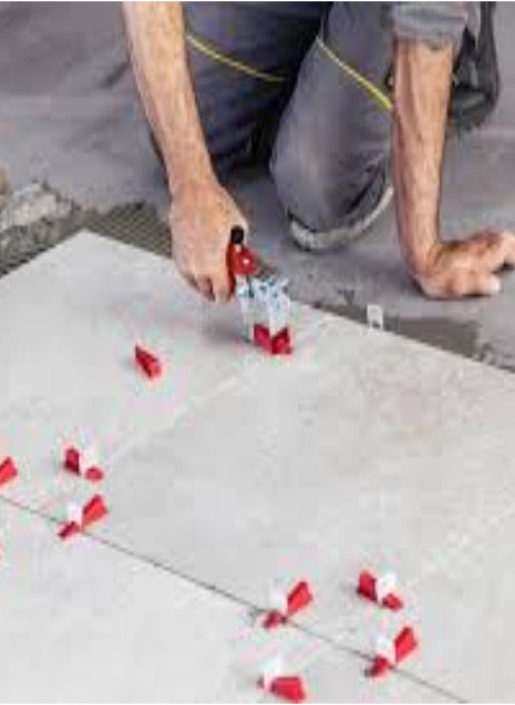 KNP - KNP Red Wedges Tile Leveling System Pack of 100 These systems are used to reduce lippage (uneven tile edges) and create a seamless finish in tiling projects. - Image 1