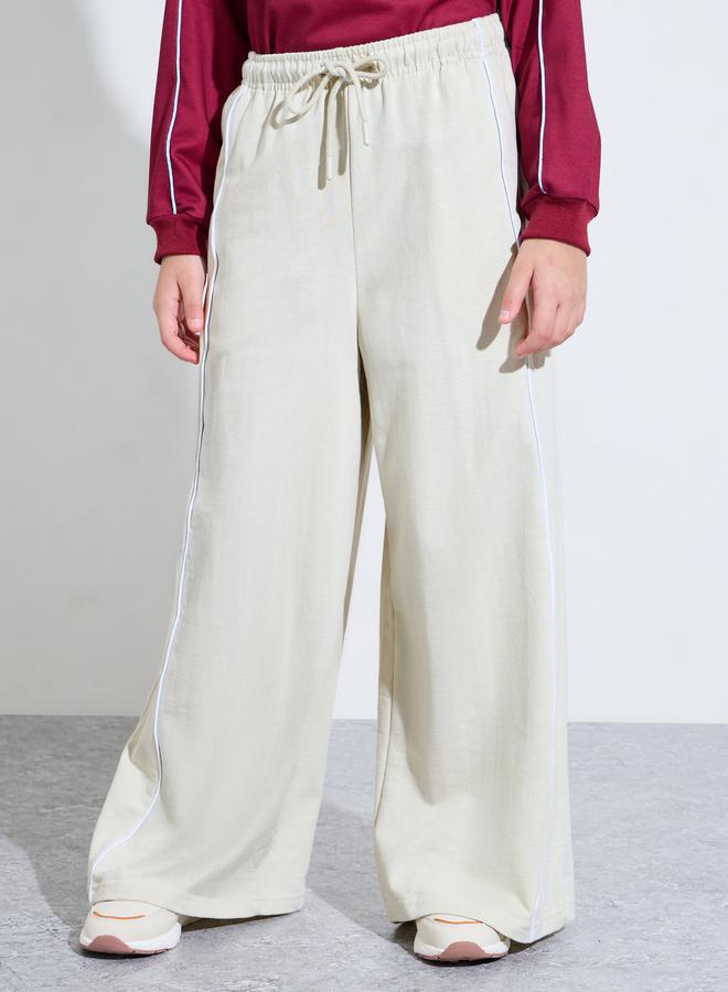 Styli Teen Girls Beige Side piping Detail Wide Leg Joggers - Image 1