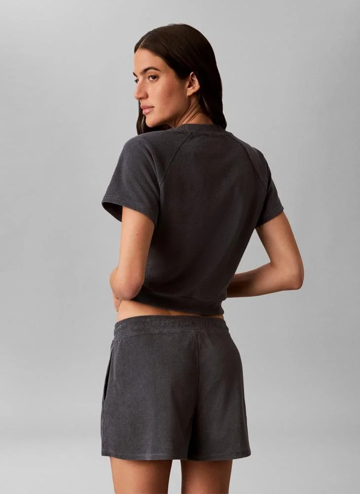 Calvin Klein Jeans Turbulence Cropped Terry Towelling Short Sleeve Jumper for Women | Best Price UAE