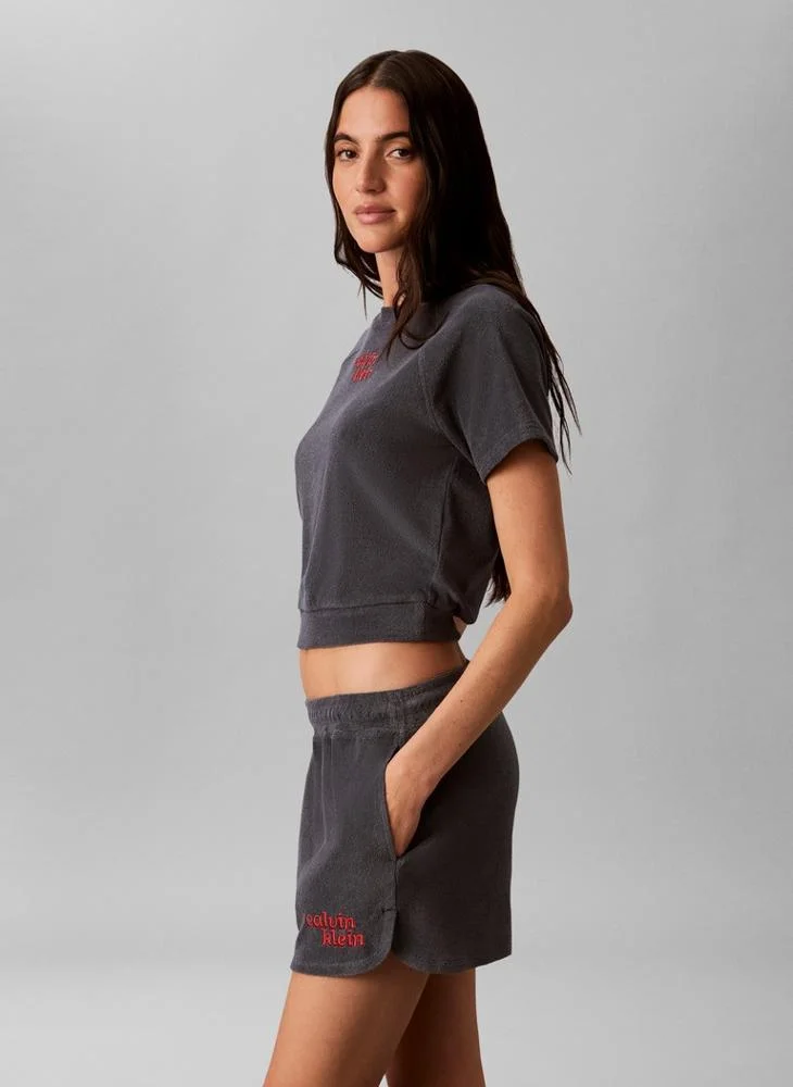 Calvin Klein Jeans Turbulence Cropped Terry Towelling Short Sleeve Jumper for Women | Best Price UAE