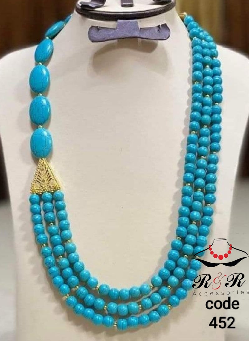 Multi-layered women's necklace made of natural turquoise and hematite