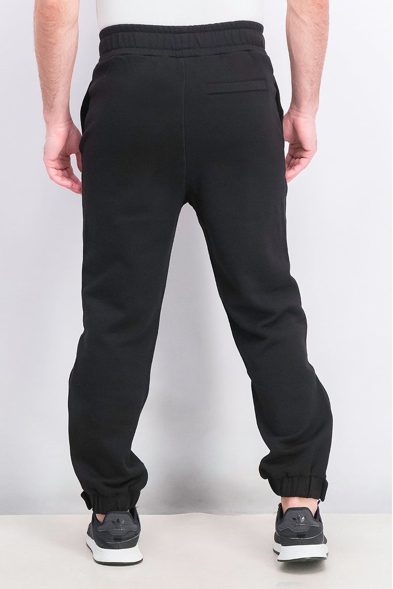 PUMA سروال رجالي عادي مزخرف بحبل سحب، أسود - Image 4