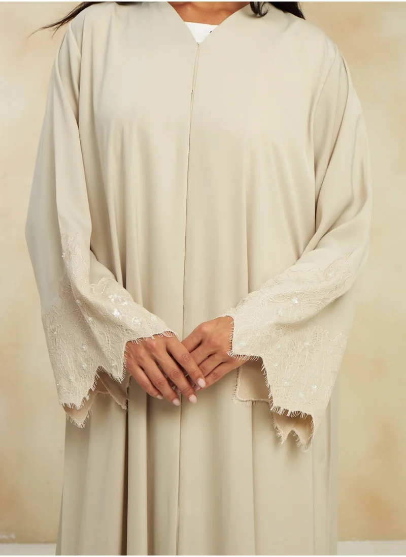 TELAL FEMINA IVORY BLOSSOM ABAYA