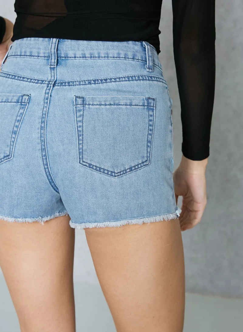 Ginger Embroidered Raw Hem Shorts