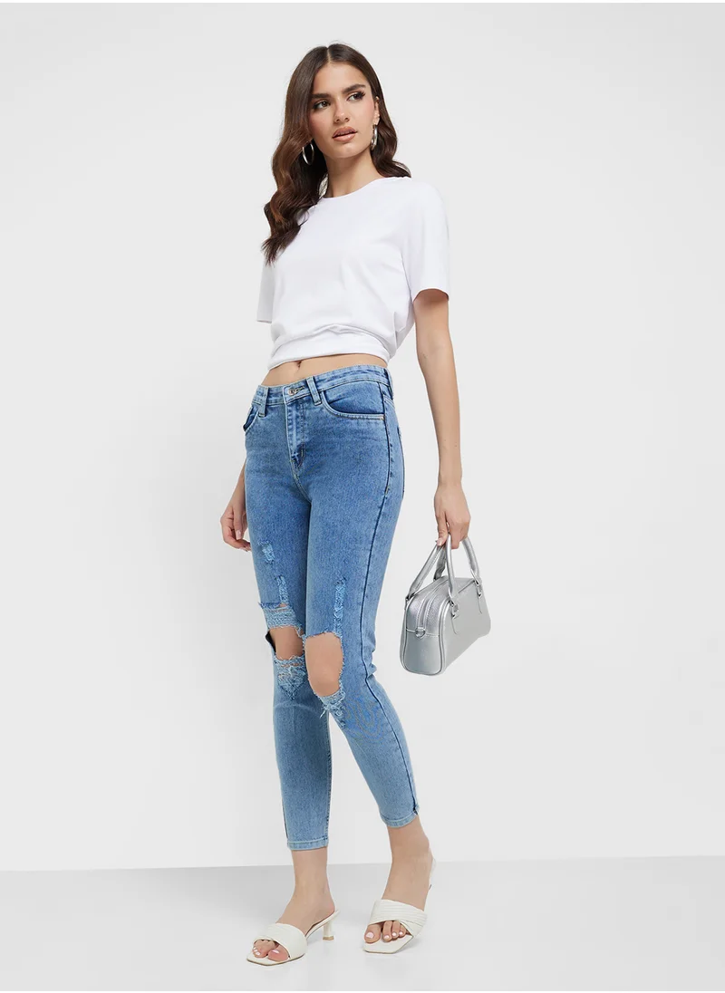 جينجر Ripped Mid Rise Skinny Jeans