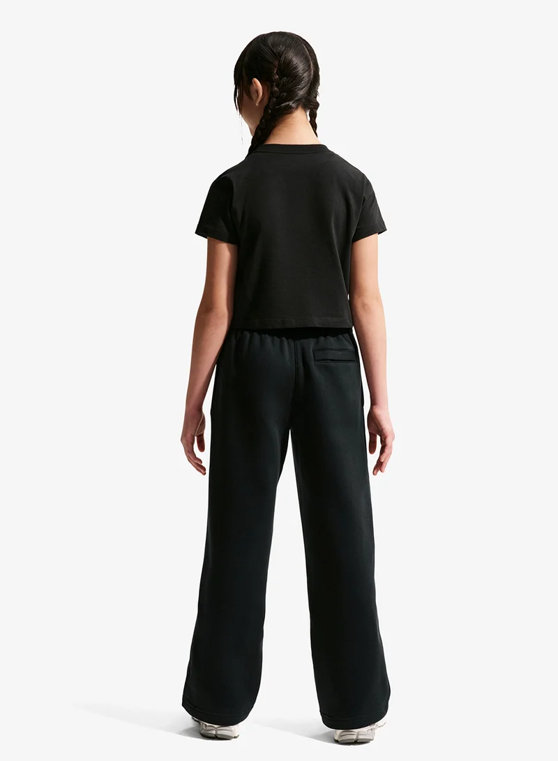 نايكي بنطلون رياضي فضفاض للشباب