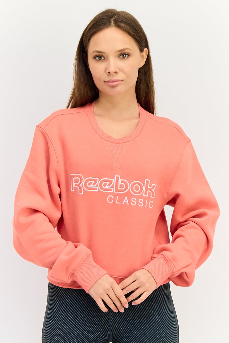 Reebok Women Sportswear Fit long Sleeve Outdoor Sweatshirt, Rose Orange - Image 1
